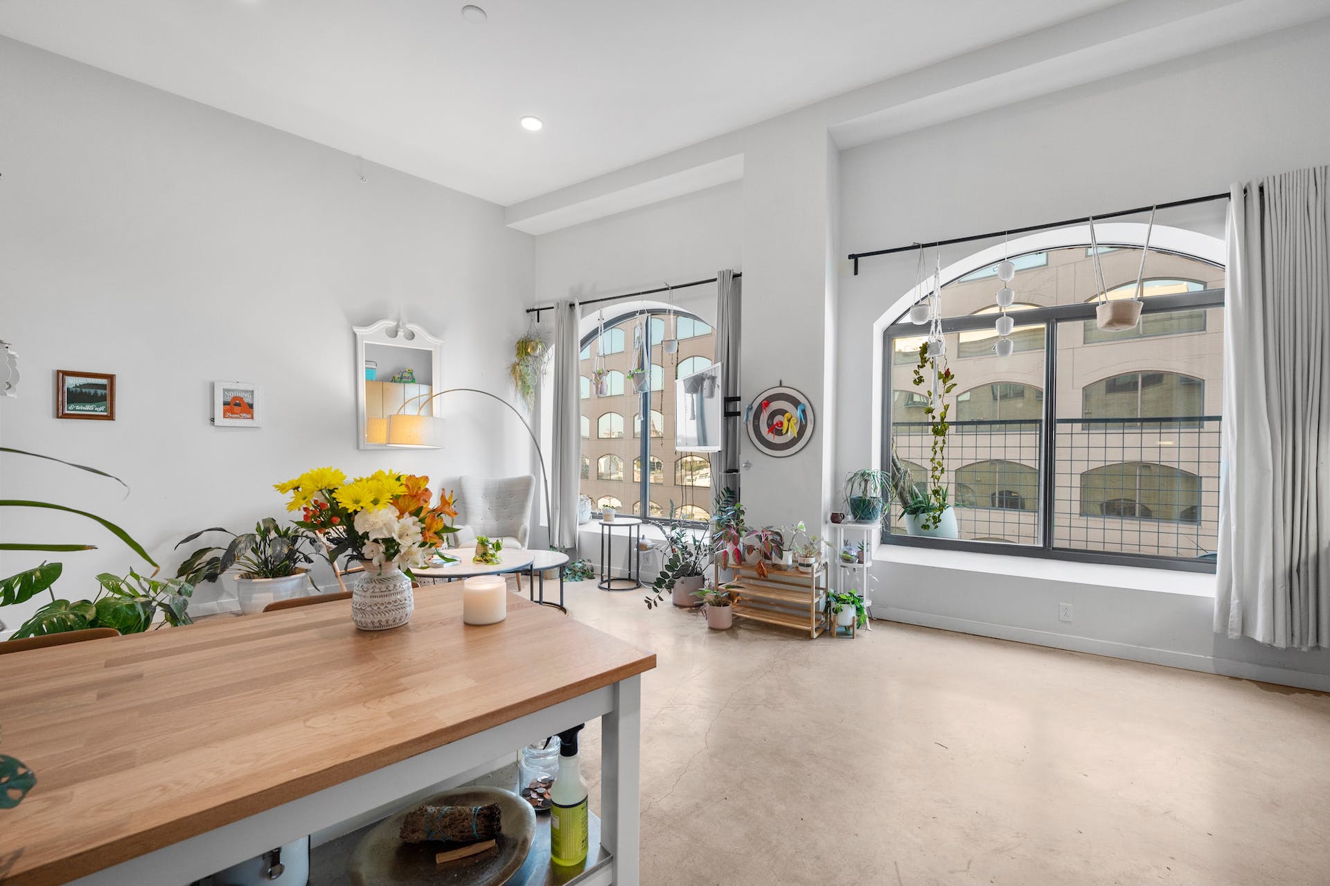 507 Sabine Street, Unit 908 Austin, TX 78701 - Photo 12 of 26 a living room with furniture and large windows