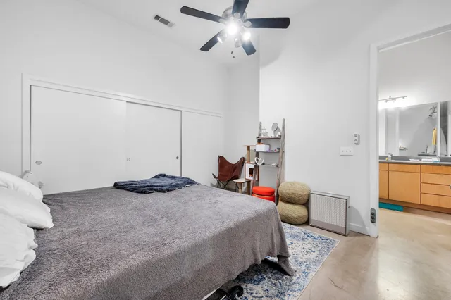 a bedroom with a bed and furniture