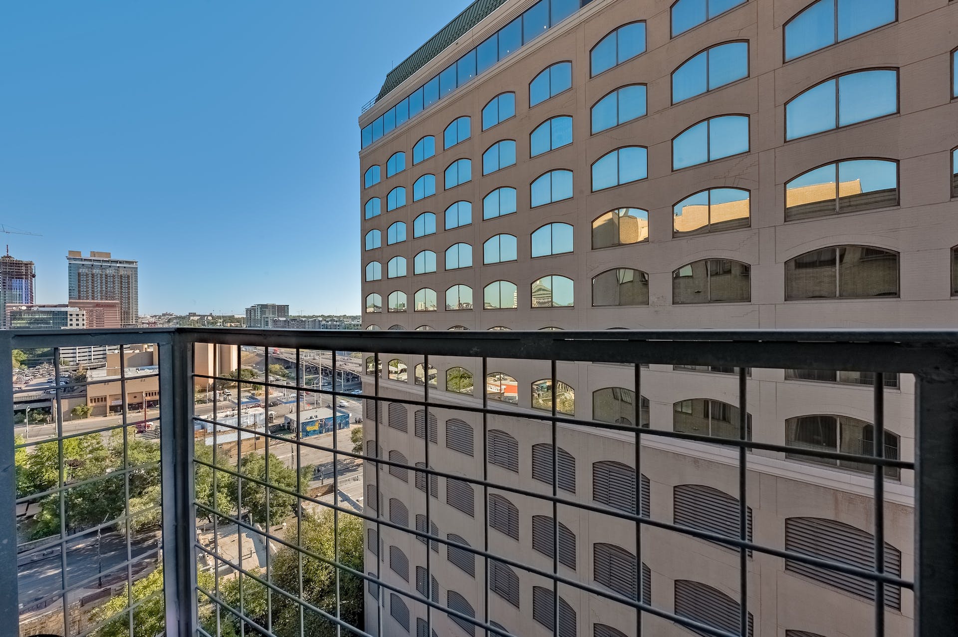 507 Sabine Street, Unit 908 Austin, TX 78701 - Photo 21 of 26 a view of a building from a balcony
