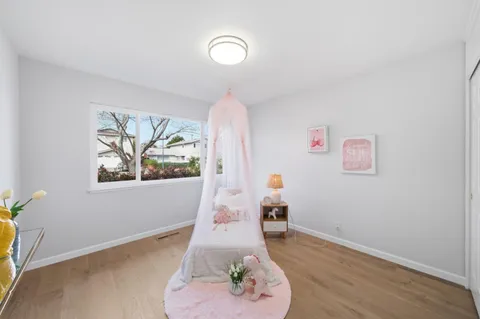 a view of livingroom with furniture and wooden floor