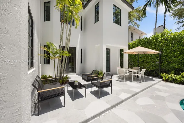 a building outdoor space with patio furniture