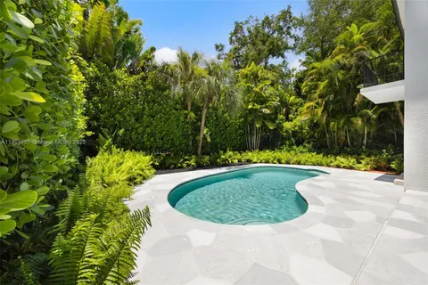 a view of a fountain in the garden