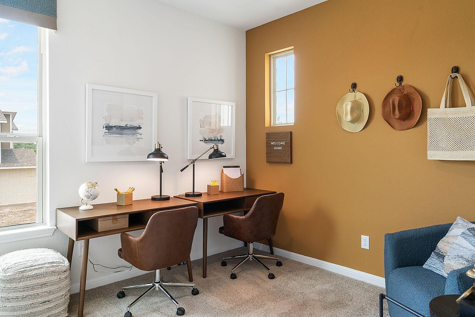 20603 B Combine Path Pflugerville, TX 78660 - Photo 17 of 19 A well-lit home office area provides two spacious desks for focused work.