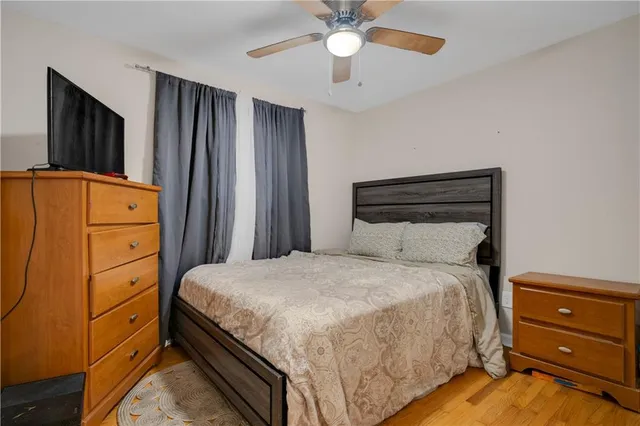 a bedroom with a bed and a cabinets