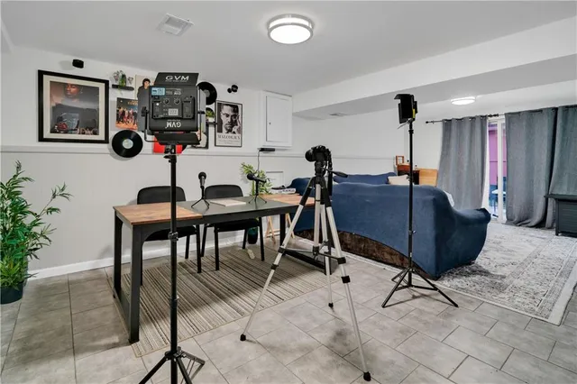 a view of a workspace with furniture