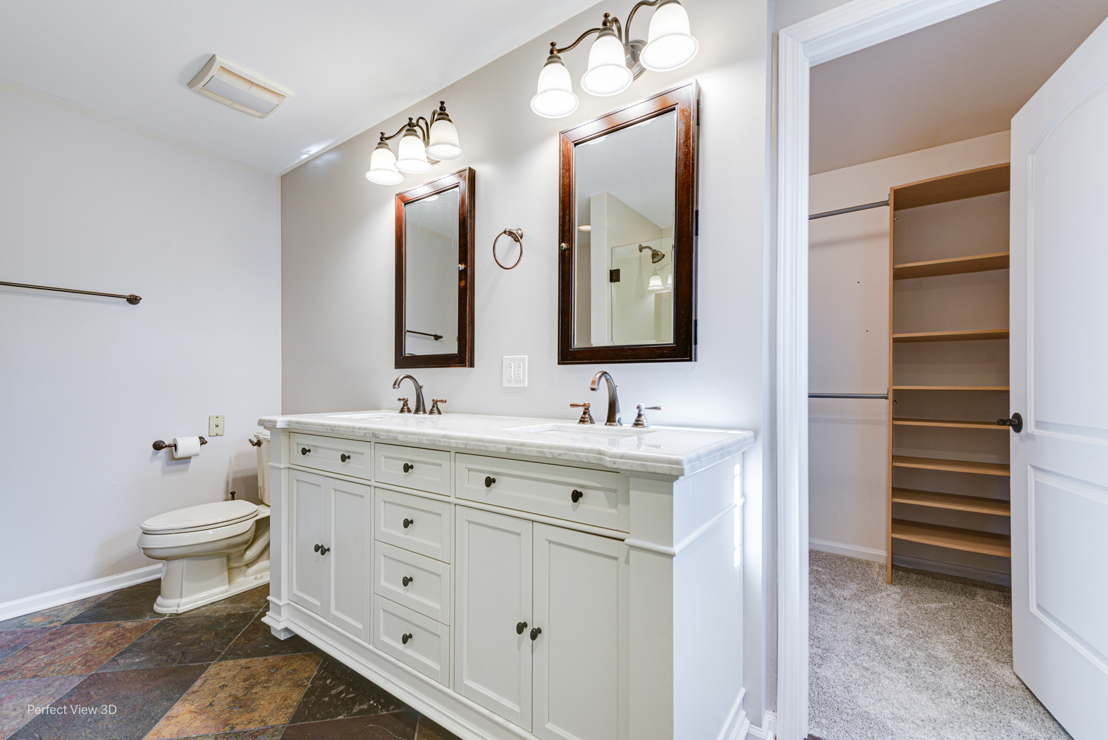512 Bison Road Oswego, IL 60543 - Photo 17 of 45 a bathroom with a double vanity sink a toilet and a mirror