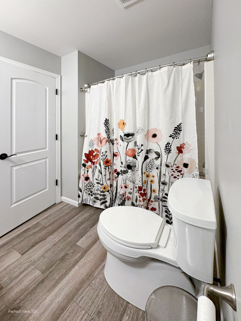 512 Bison Road Oswego, IL 60543 - Photo 27 of 45 a bathroom with a sink toilet and shower
