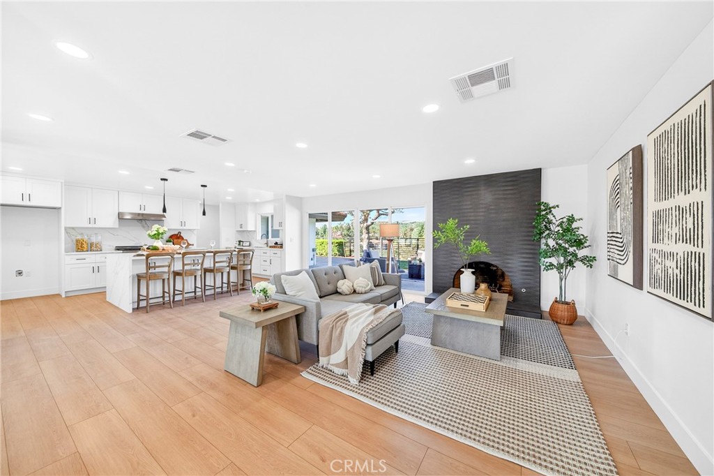 930 Rancho Circle Fullerton, CA 92835 - Photo 12 of 57 a living room with furniture and a fireplace