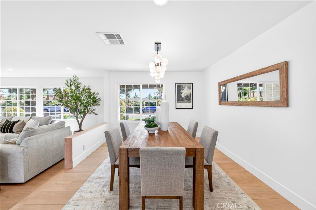 930 Rancho Circle Fullerton, CA 92835 - Photo 13 of 57 a dining room with furniture a window and a chandelier