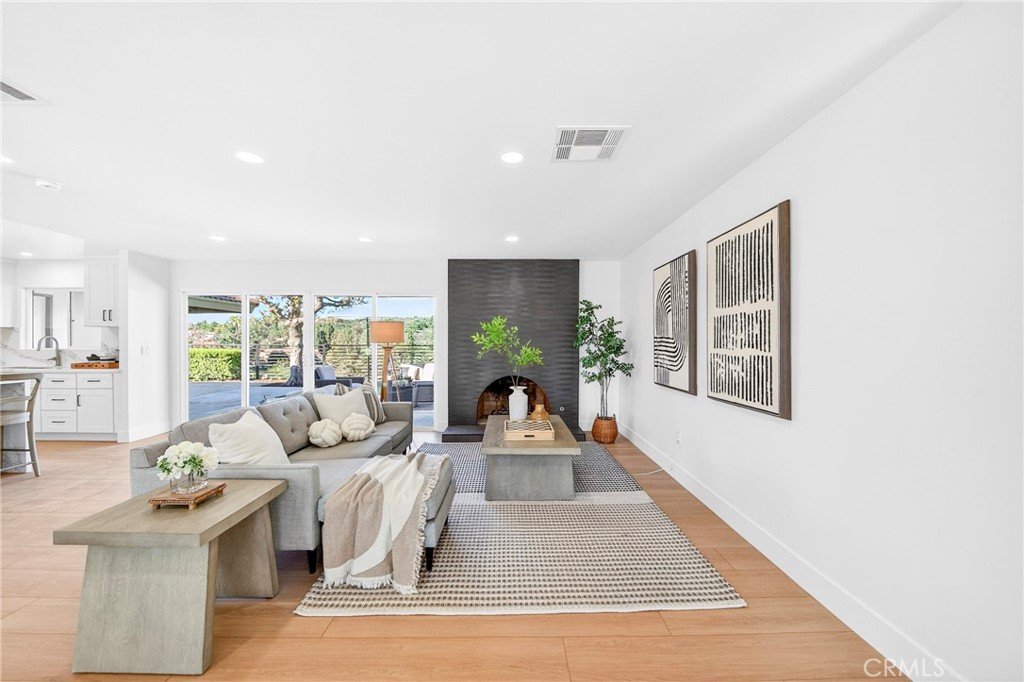 930 Rancho Circle Fullerton, CA 92835 - Photo 24 of 57 a living room with furniture large window and outer view