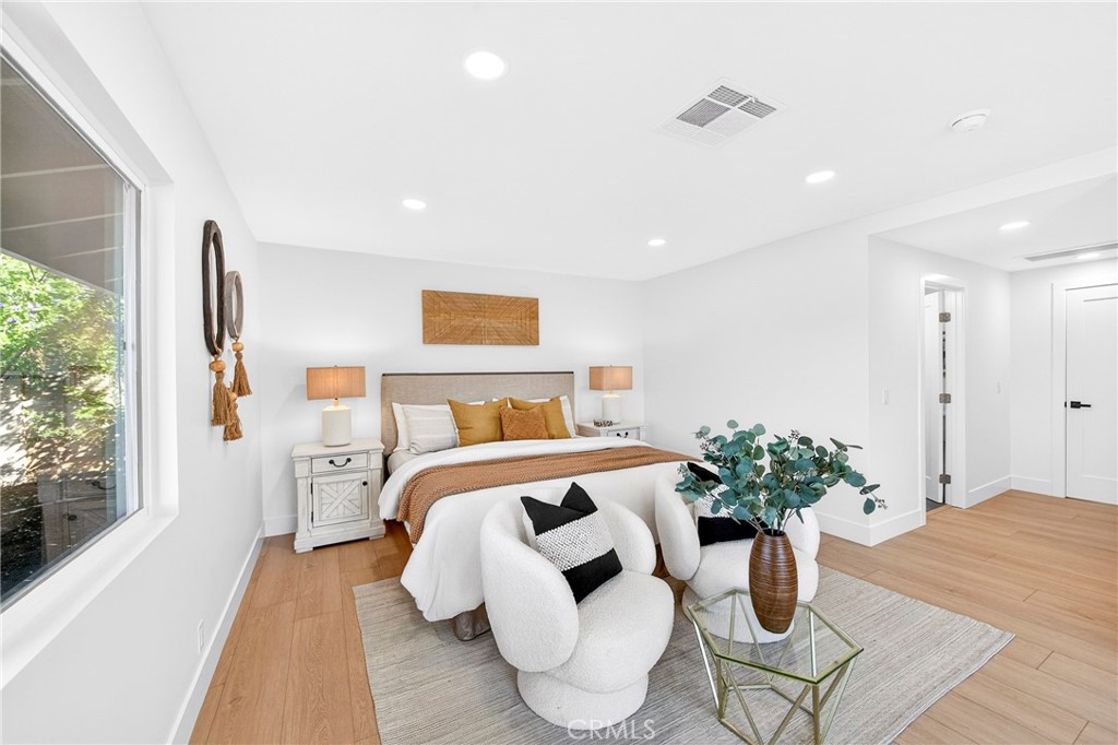 930 Rancho Circle Fullerton, CA 92835 - Photo 29 of 57 a bed room with furniture and a potted plant