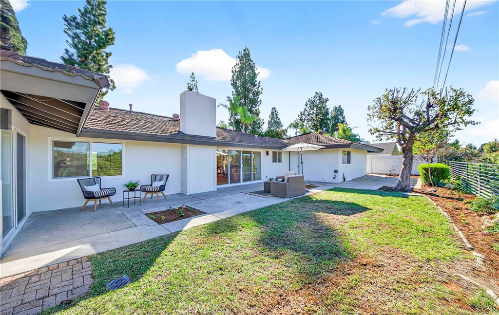 930 Rancho Circle Fullerton, CA 92835 - Photo 43 of 57 a view of a house with a yard and sitting area