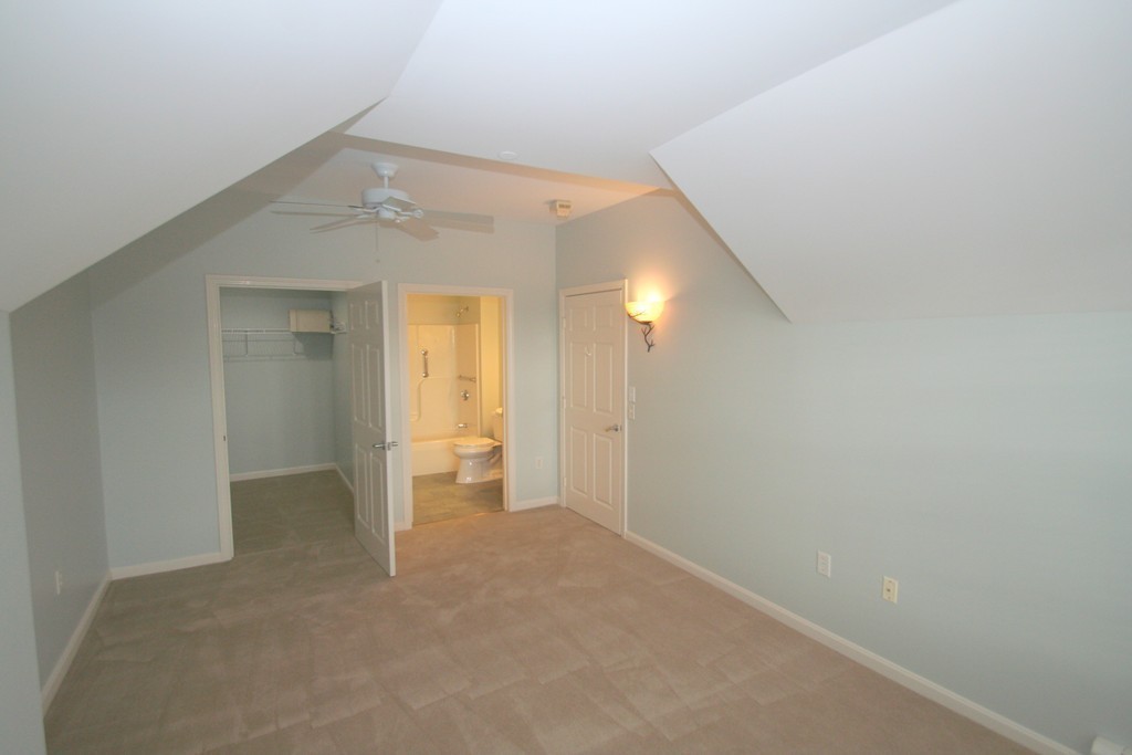7 Assinippi Avenue, Unit 306 Norwell, MA 02061 - Photo 12 of 20 a view of an empty room and a gallery