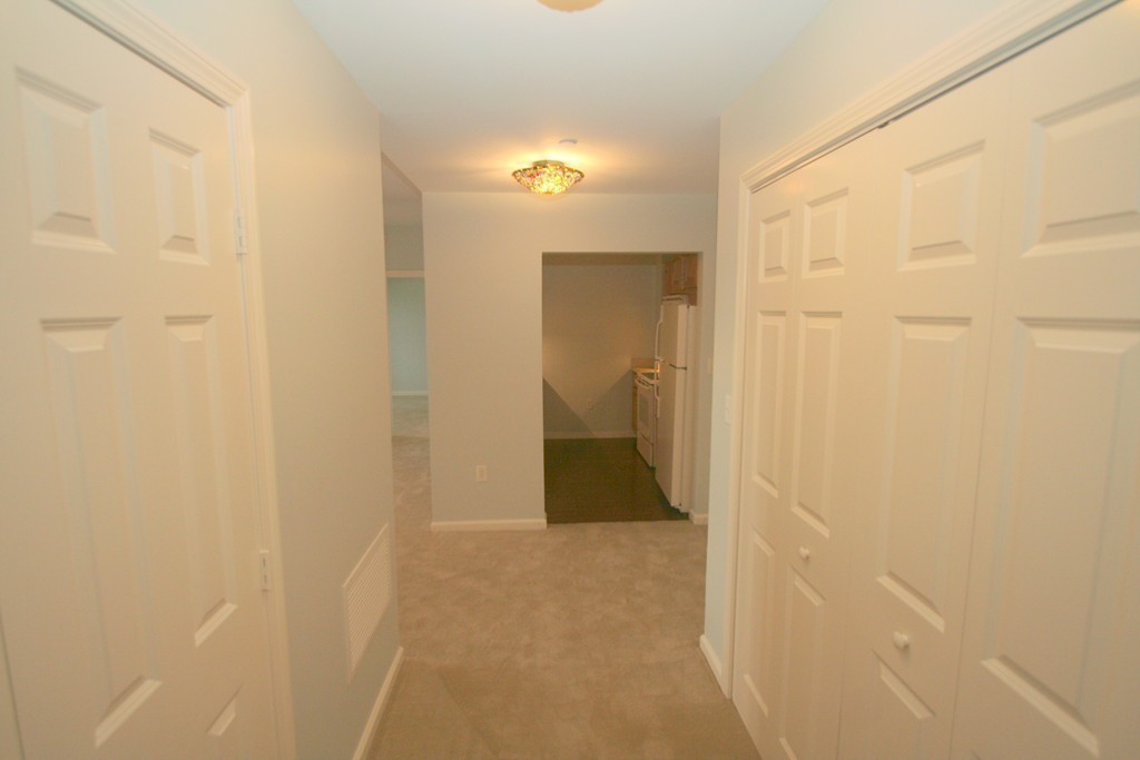 7 Assinippi Avenue, Unit 306 Norwell, MA 02061 - Photo 15 of 20 a bathroom with a shower and a toilet