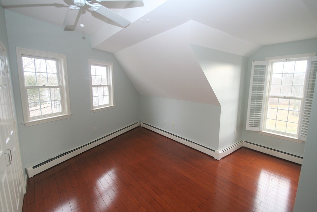 7 Assinippi Avenue, Unit 306 Norwell, MA 02061 - Photo 8 of 20 a view of a room with wooden floor and windows