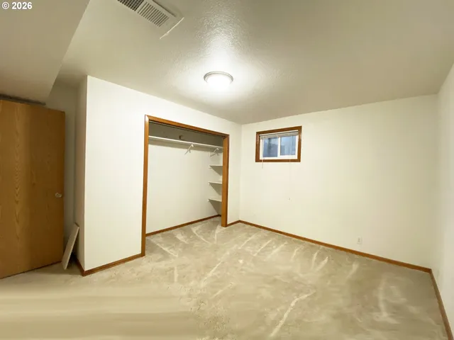 a view of a livingroom with wooden floor