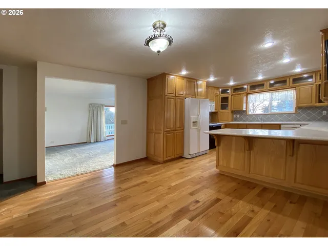 a black and white photo of a big room