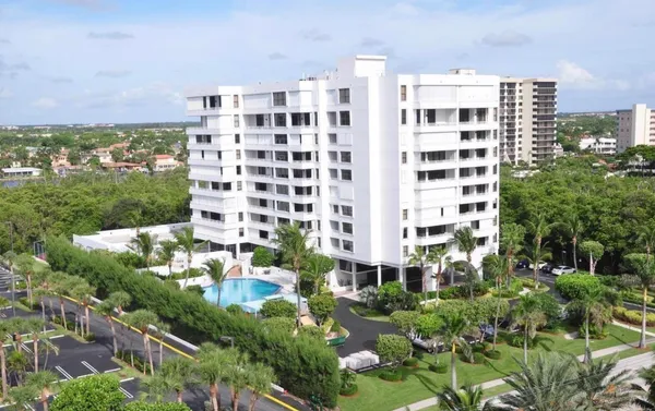 a view of a building with a garden