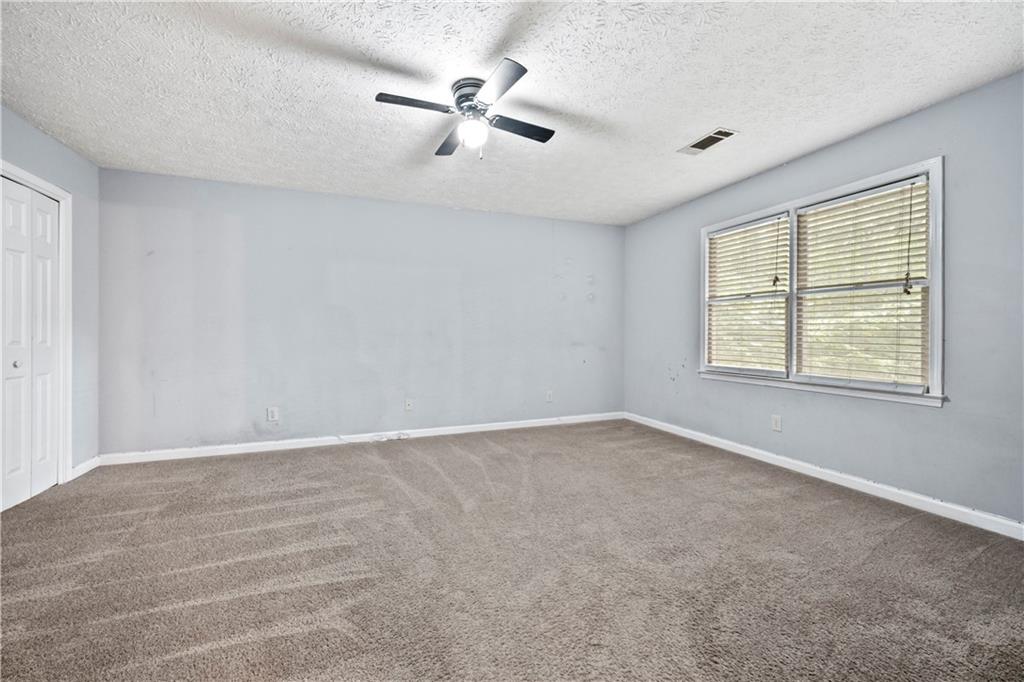 2009 Ben Higgins Road Dahlonega, GA 30533 - Photo 16 of 25 a view of an empty room with a window