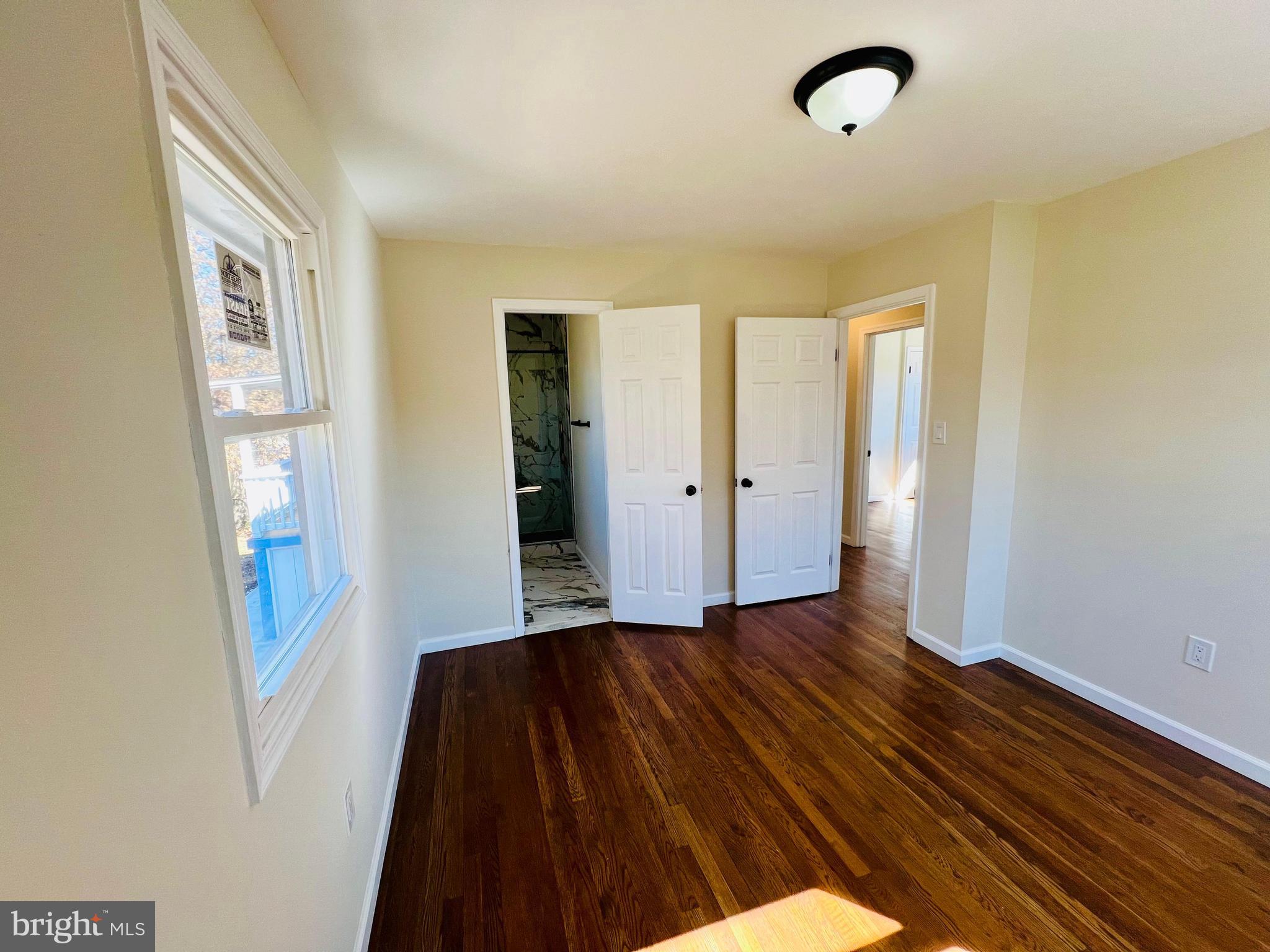 9826 Lomond Drive Manassas, VA 20109 - Photo 25 of 78 a view of a livingroom with wooden floor