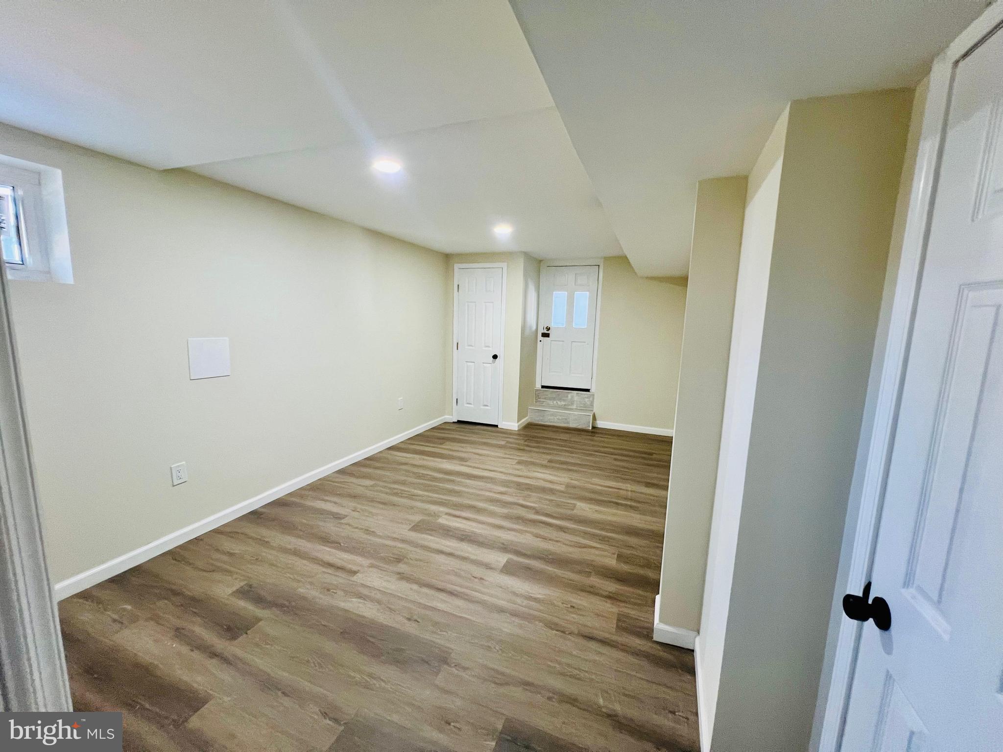 9826 Lomond Drive Manassas, VA 20109 - Photo 45 of 78 a view of a room with wooden floor