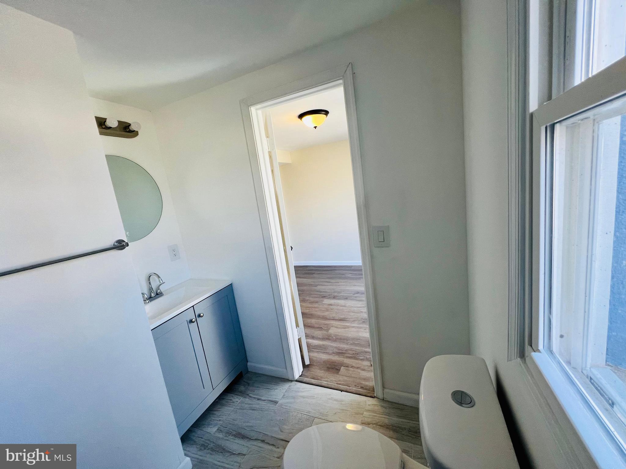 9826 Lomond Drive Manassas, VA 20109 - Photo 52 of 78 a bathroom with a sink a toilet and shower