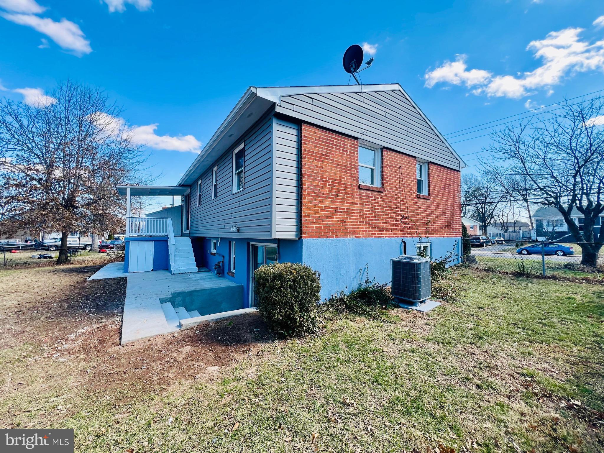 9826 Lomond Drive Manassas, VA 20109 - Photo 65 of 78 a front view of a house with a yard