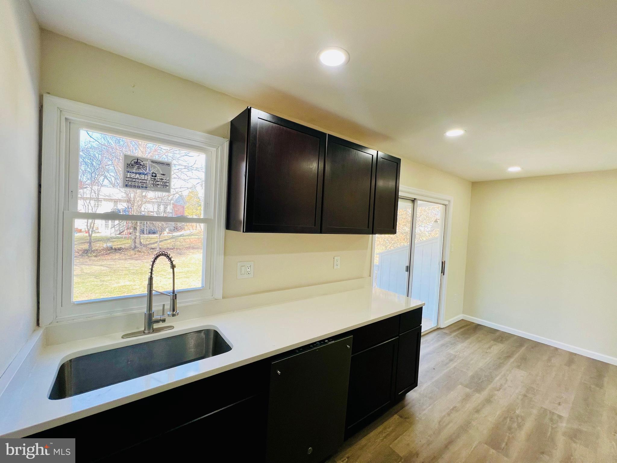 9826 Lomond Drive Manassas, VA 20109 - Photo 8 of 78 a kitchen with a sink and cabinets
