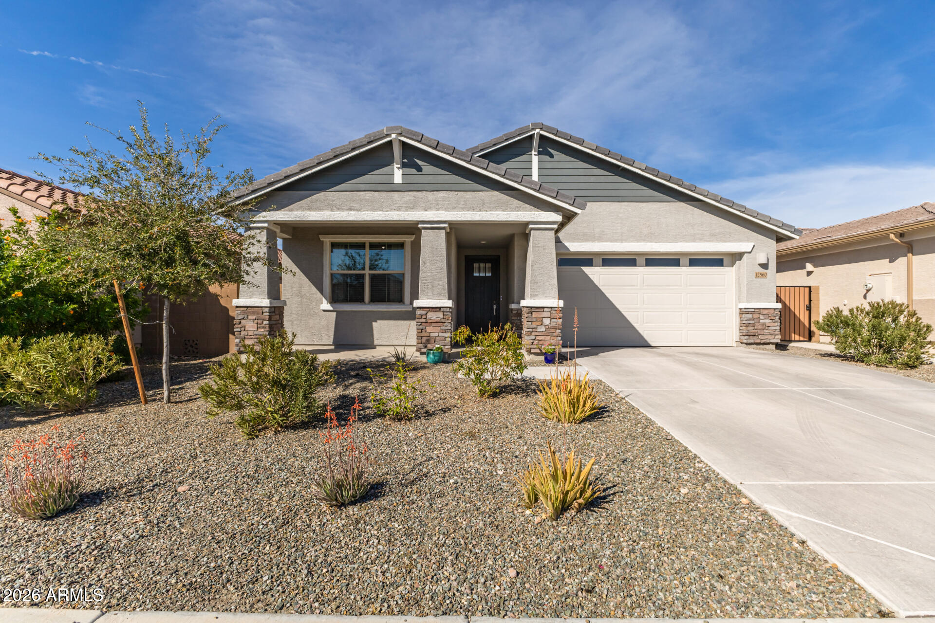 12560 East Ballentine Road Gold Canyon, AZ 85118 - Photo 1 of 35 a front view of a house with garden