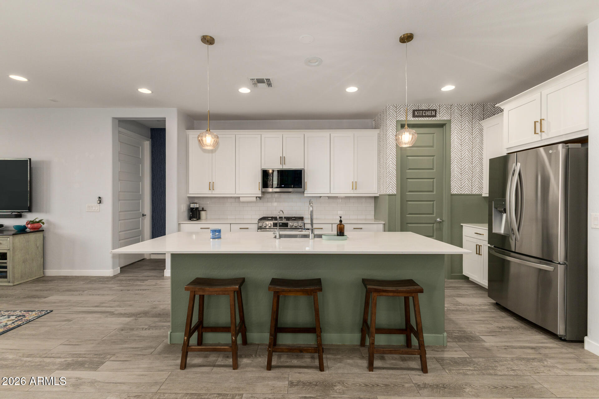 12560 East Ballentine Road Gold Canyon, AZ 85118 - Photo 14 of 35 a kitchen with refrigerator and chairs