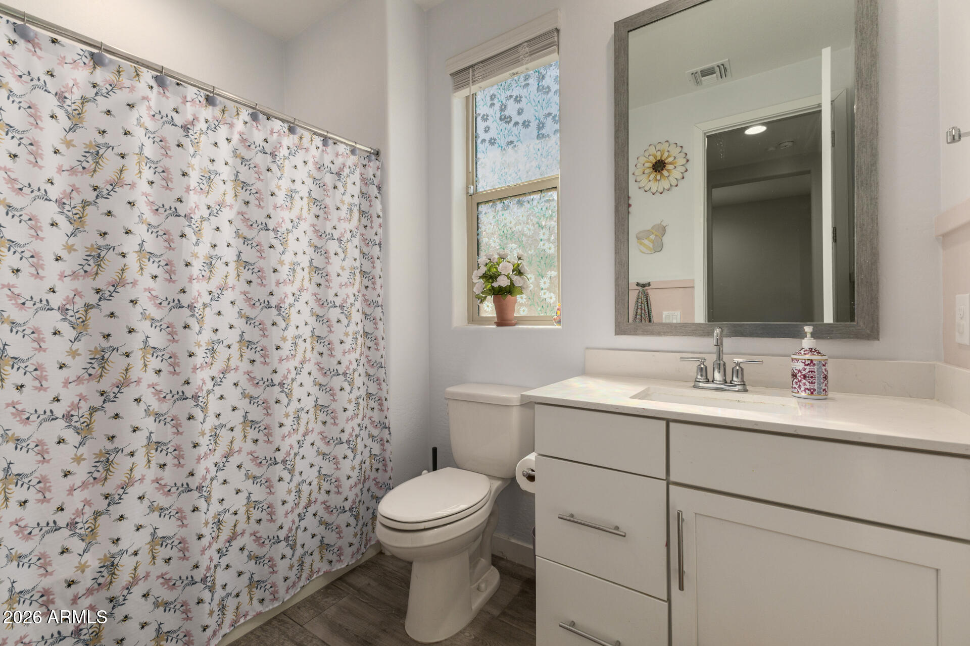 12560 East Ballentine Road Gold Canyon, AZ 85118 - Photo 26 of 35 a bathroom with a toilet sink and mirror