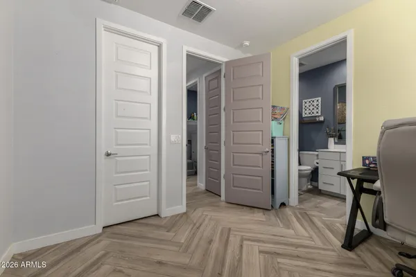 wooden floor and windows in a room