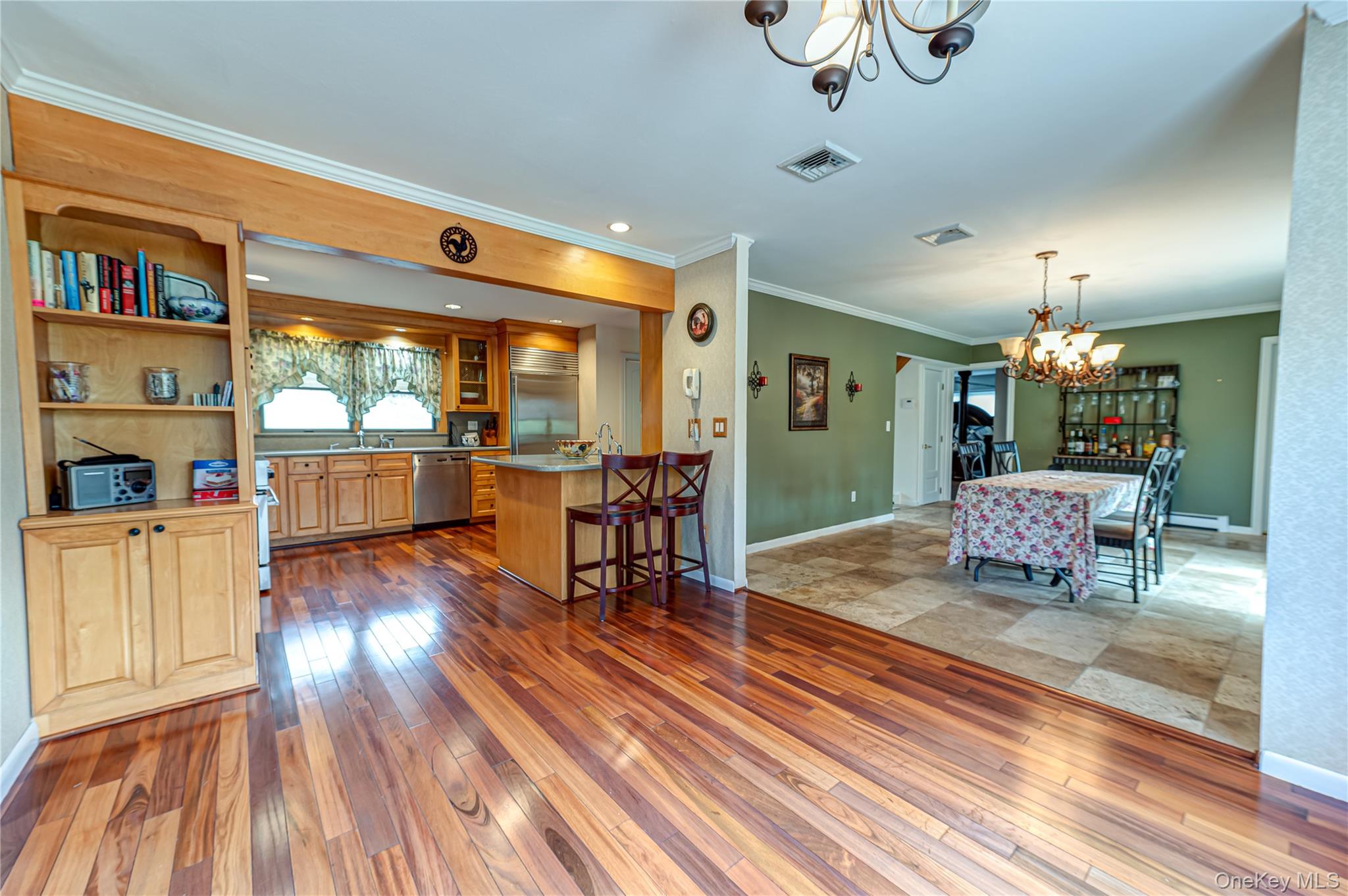 114 Randall Road Ridge, NY 11961 - Photo 13 of 48 a living room with furniture and a wooden floor