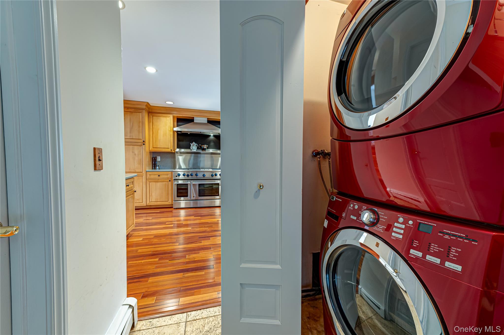 114 Randall Road Ridge, NY 11961 - Photo 14 of 48 a view of a hallway with washer and dryer