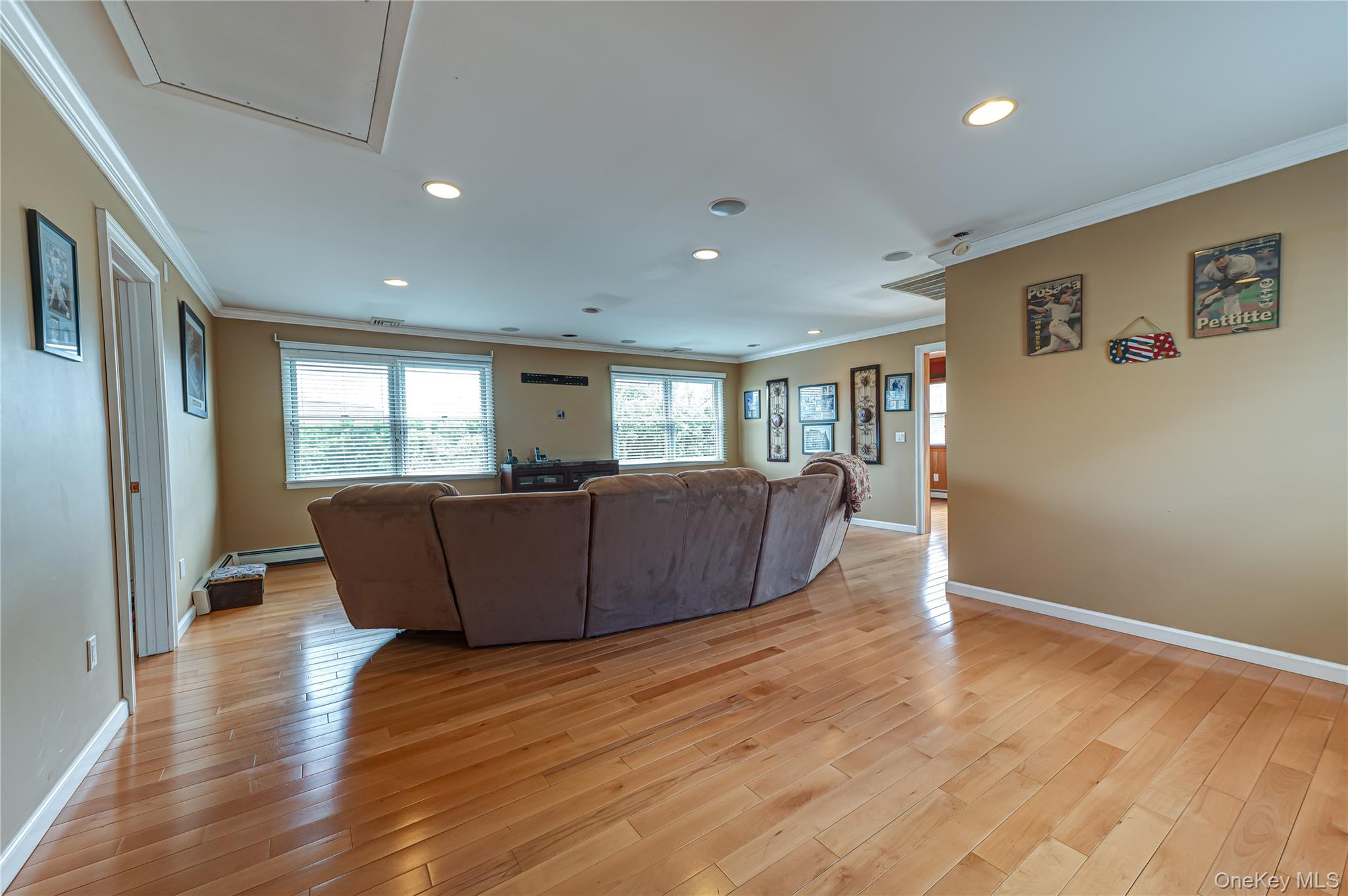 114 Randall Road Ridge, NY 11961 - Photo 20 of 48 a living room with wooden floor and large window