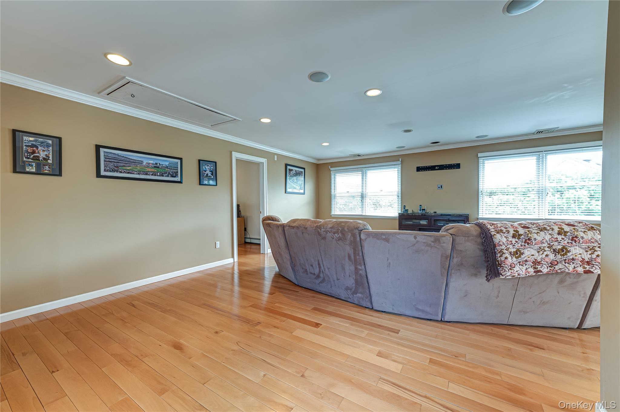 114 Randall Road Ridge, NY 11961 - Photo 21 of 48 a living room with furniture and a large window