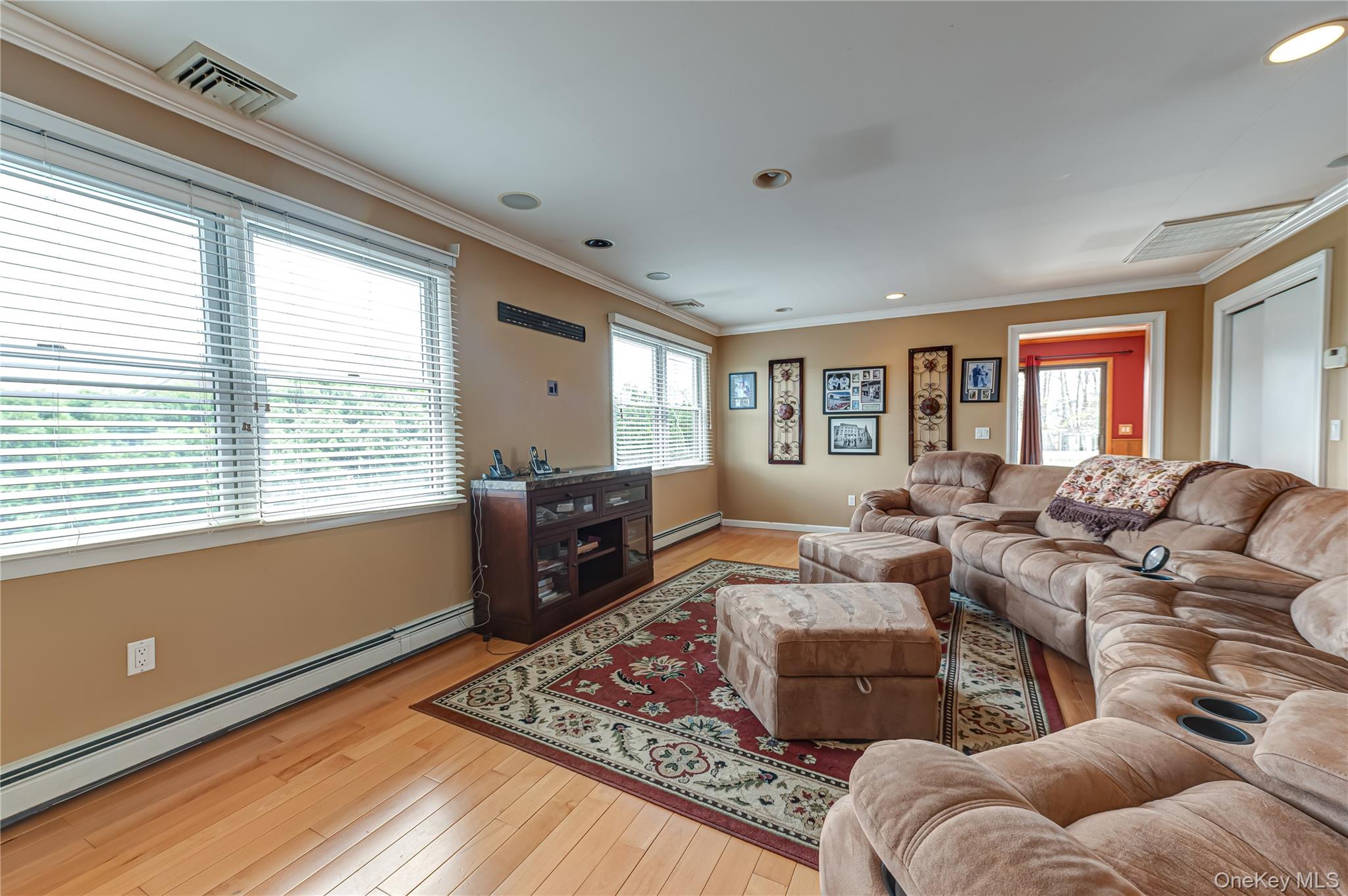 114 Randall Road Ridge, NY 11961 - Photo 23 of 48 a living room with furniture and a window