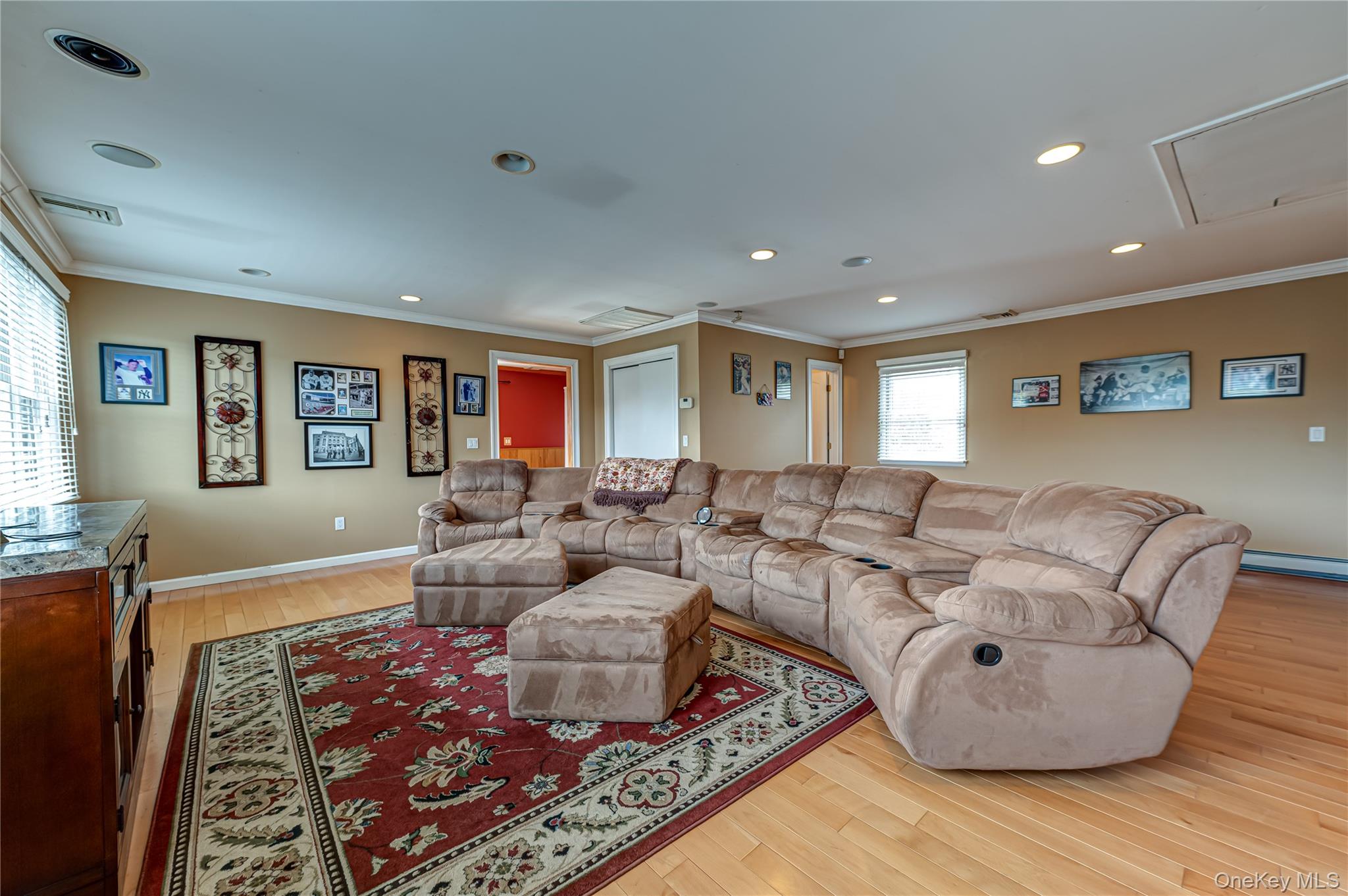 114 Randall Road Ridge, NY 11961 - Photo 24 of 48 a living room with furniture and a couch