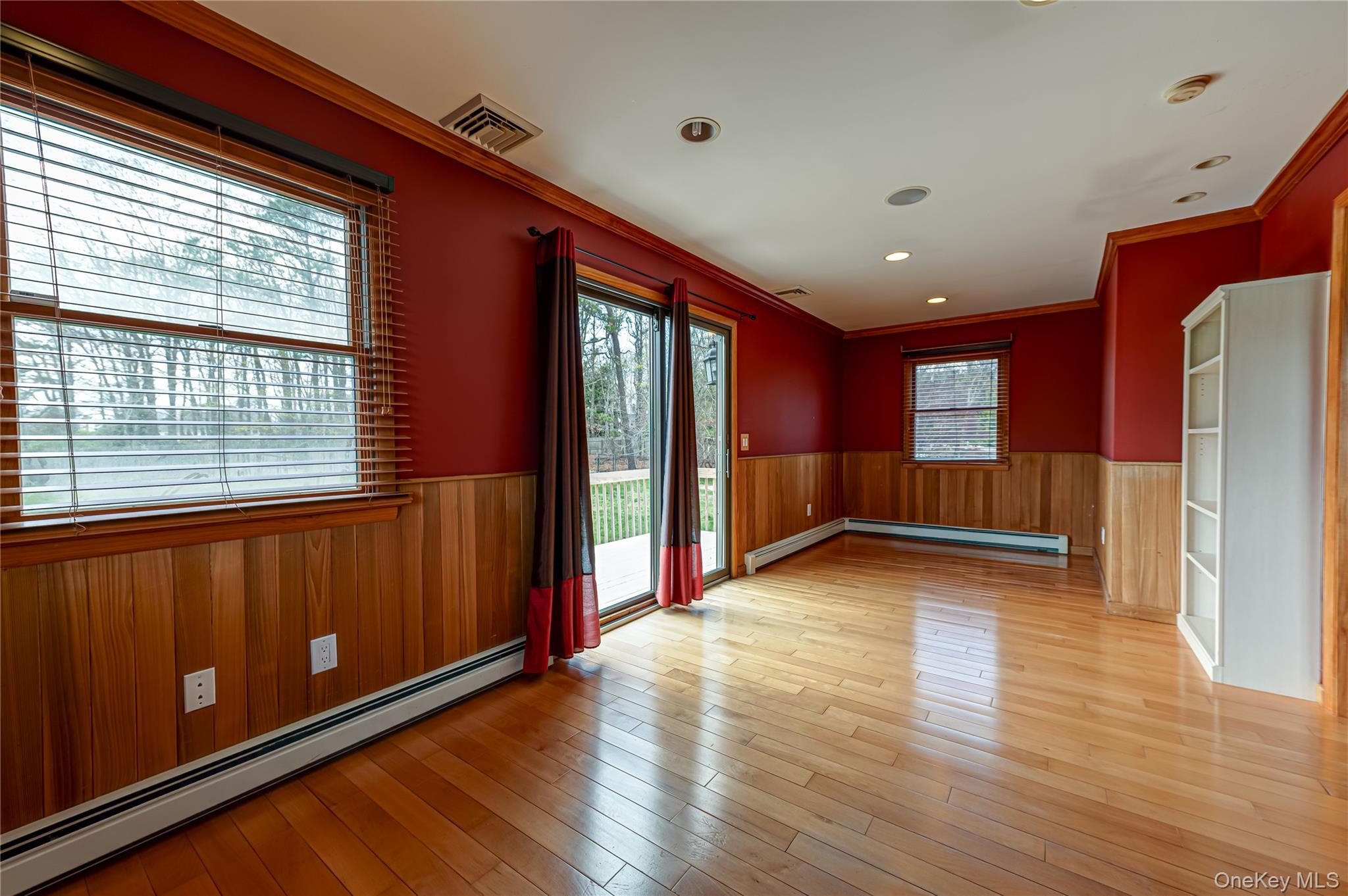 114 Randall Road Ridge, NY 11961 - Photo 27 of 48 a view of an empty room with a window