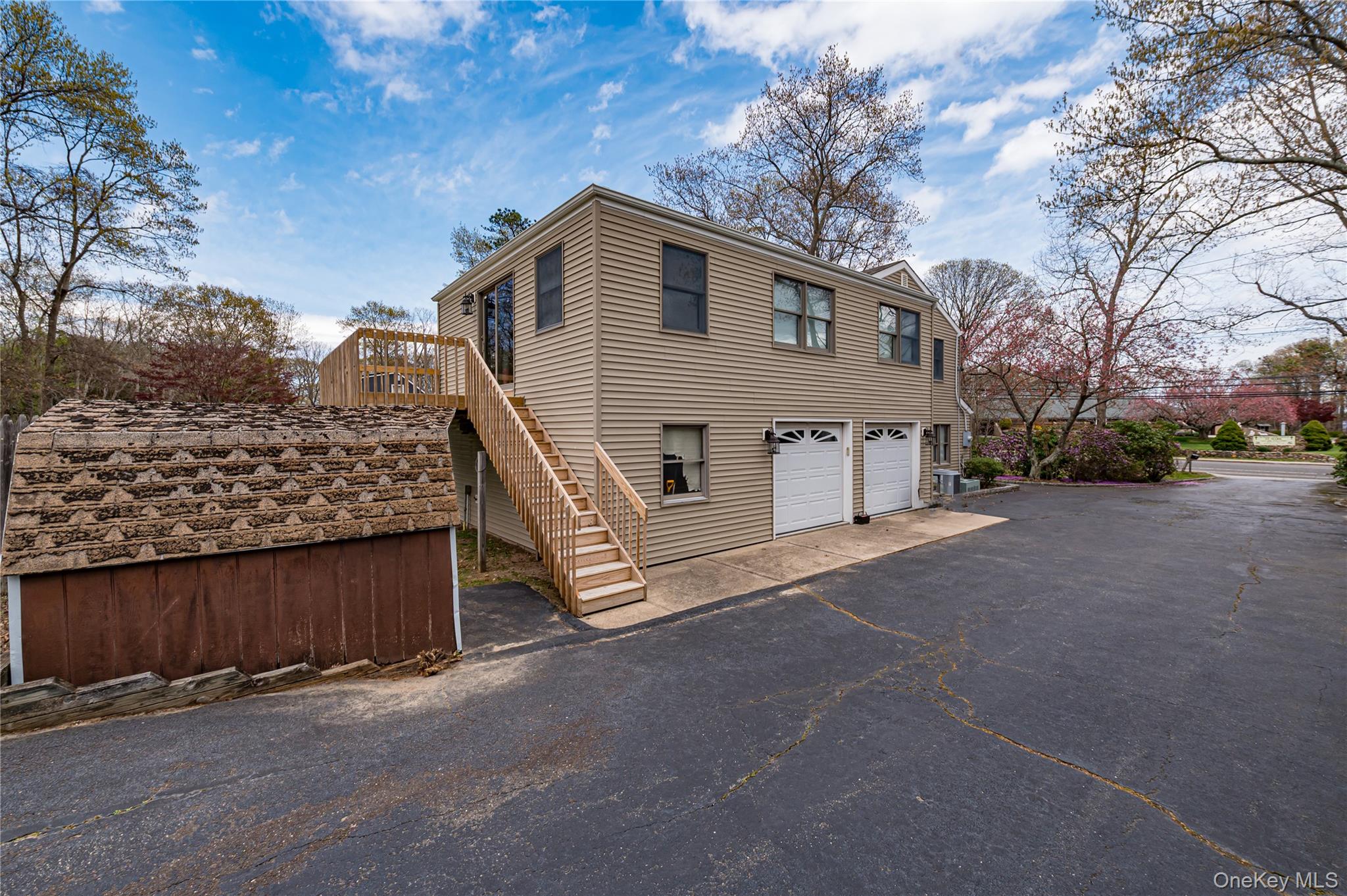114 Randall Road Ridge, NY 11961 - Photo 3 of 48 a view of a house with a yard