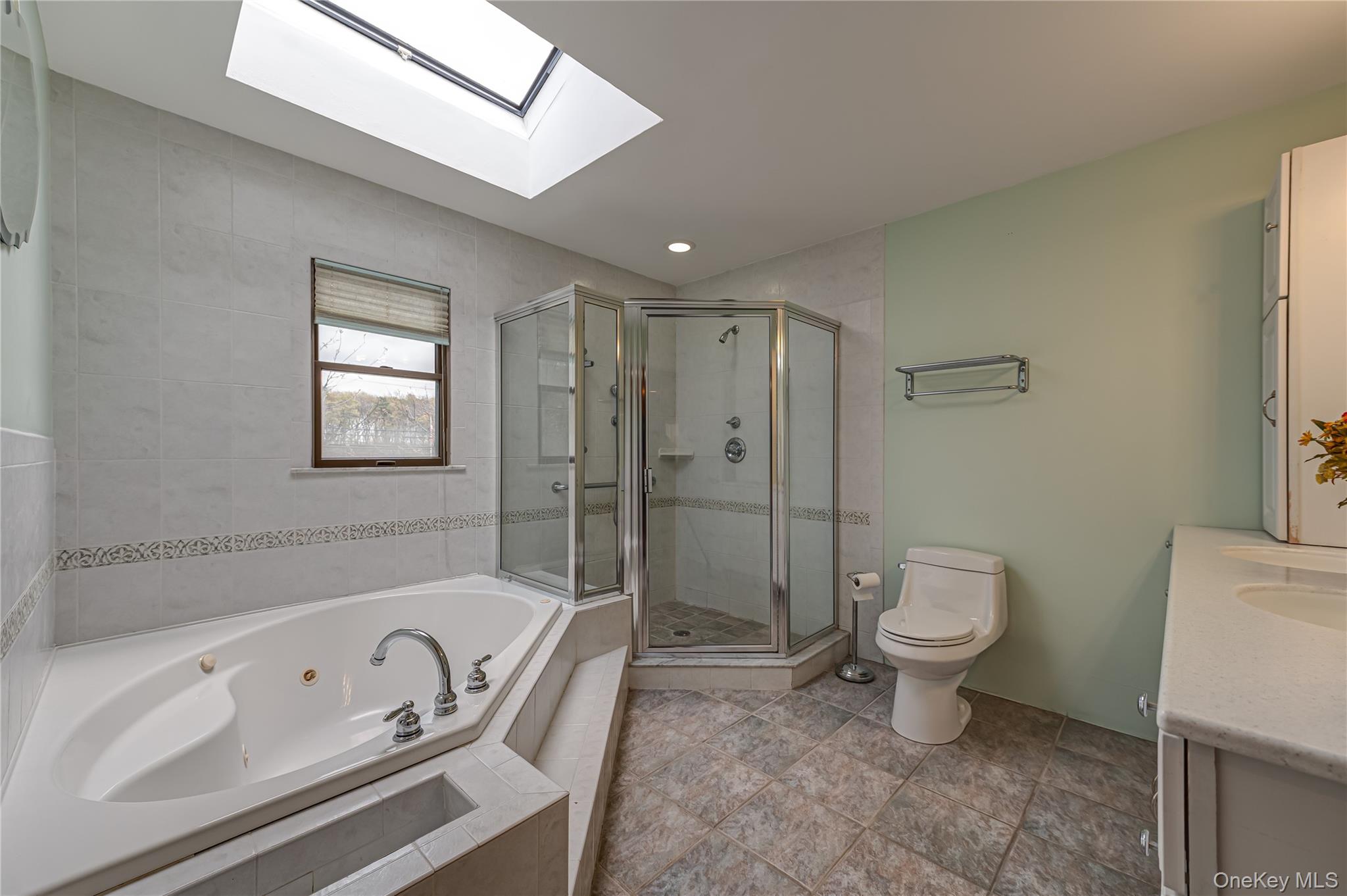 114 Randall Road Ridge, NY 11961 - Photo 34 of 48 a bathroom with a toilet a sink a mirror and a bathtub
