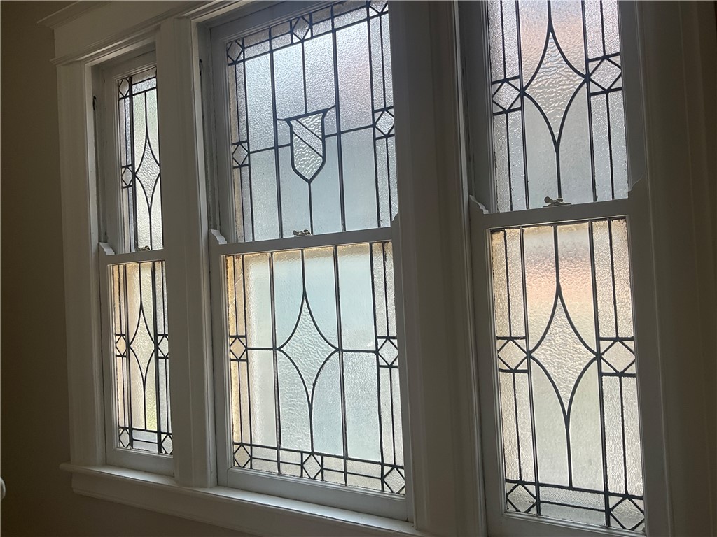 923 Harvard Street Rochester, NY 14610 - Photo 8 of 45 The leaded glass windows are lovely!