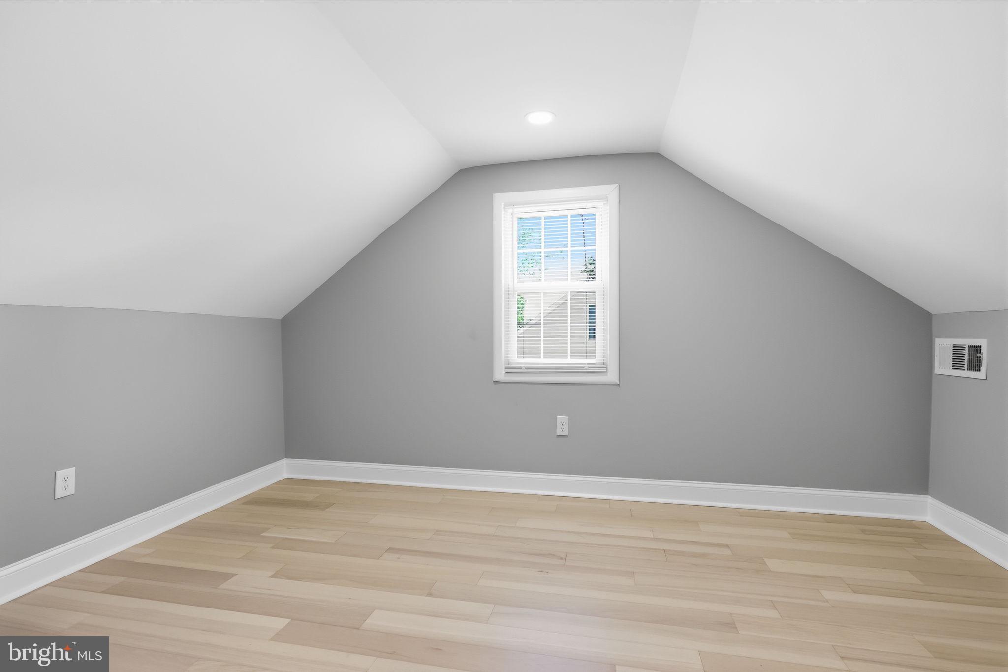 340 West Broad Street Hatfield, PA 19440 - Photo 33 of 55 an empty room with wooden floor and windows