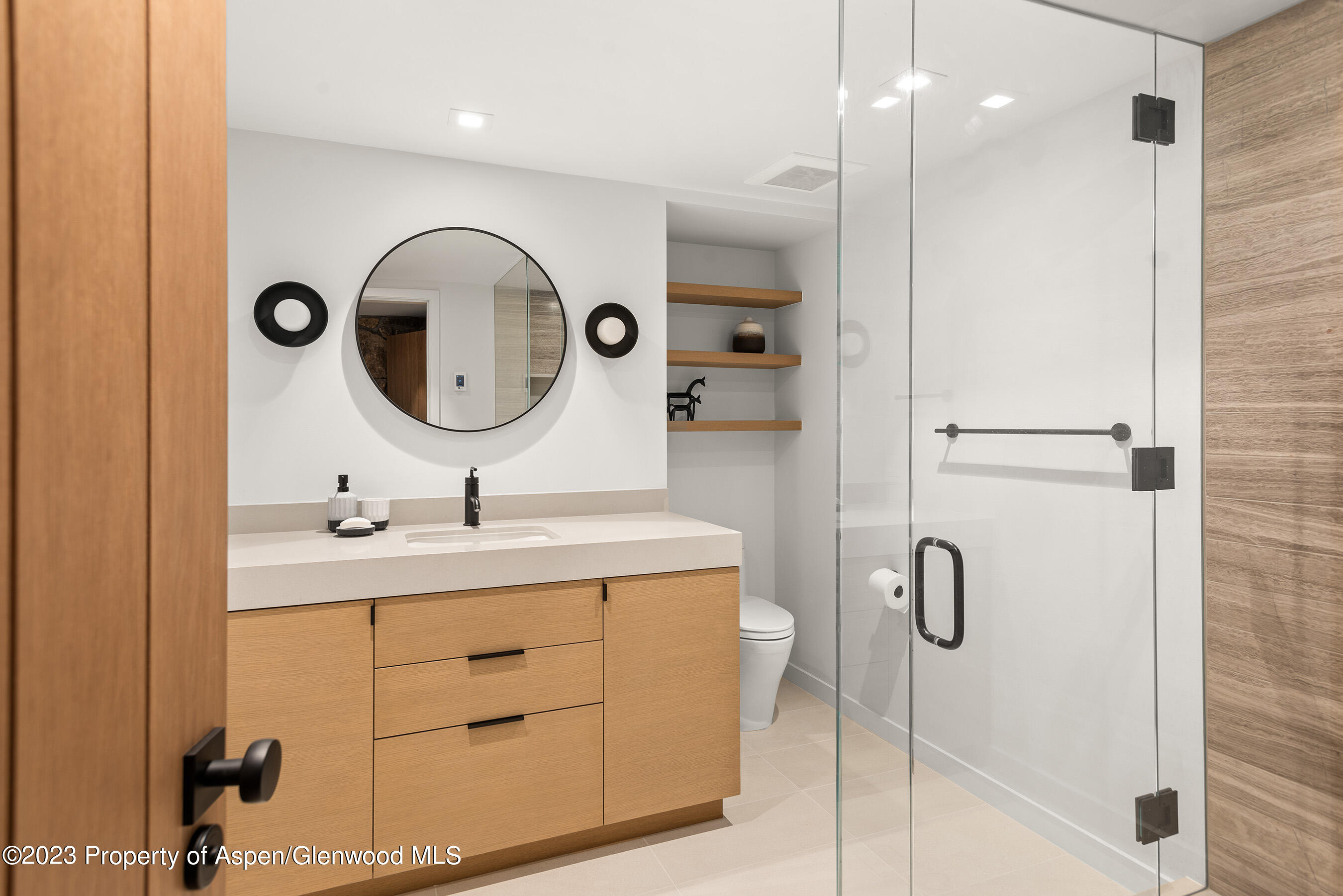 164 Eastwood Road Aspen, CO 81611 - Photo 18 of 42 a bathroom with a sink and a mirror