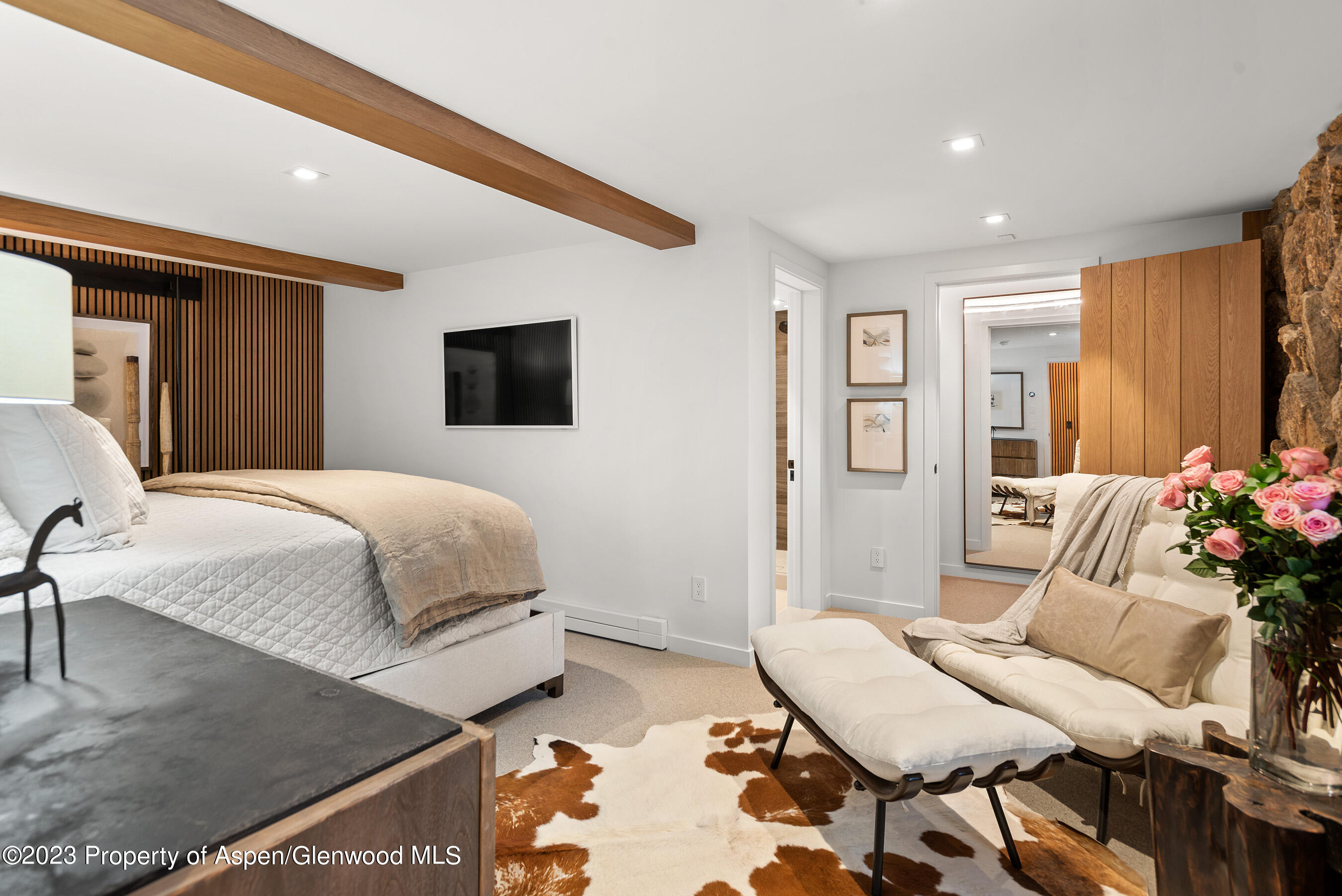 164 Eastwood Road Aspen, CO 81611 - Photo 20 of 42 a bedroom with a bed and furniture