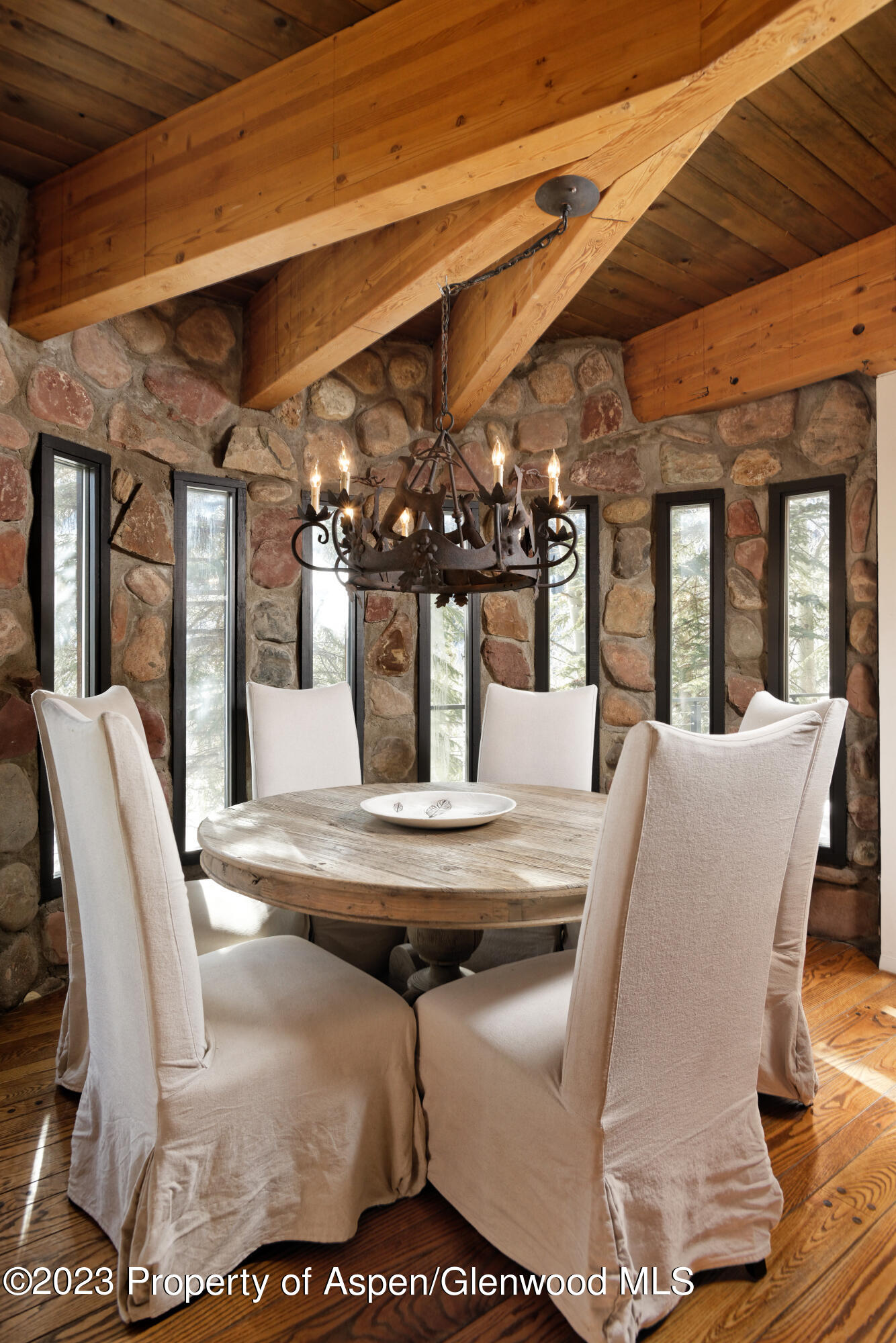 164 Eastwood Road Aspen, CO 81611 - Photo 7 of 42 a view of a dining room with furniture