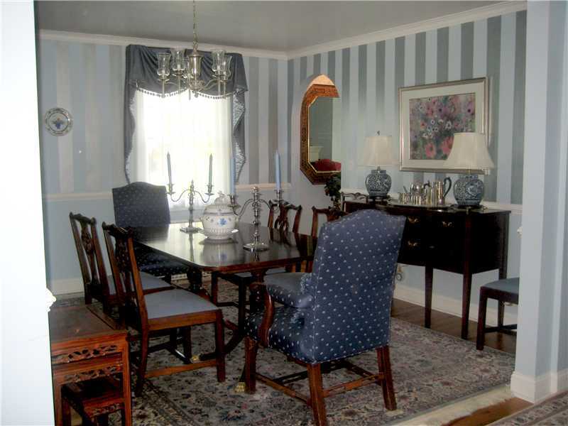 6 Northridge Road Old Greenwich, CT 06870 - Photo 5 of 14 a view of a dining room with furniture window and wooden floor