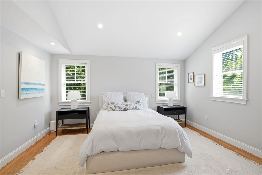 59 Elm Street Hingham, MA 02043 - Photo 18 of 33 a bedroom with a bed and a window