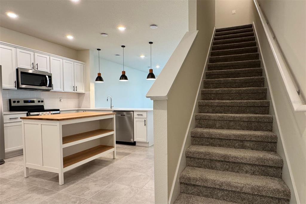 2759 Fetching Trail Davenport, FL 33896 - Photo 7 of 14 a view of an entryway and kitchen