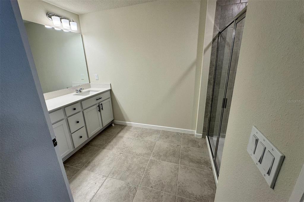 2759 Fetching Trail Davenport, FL 33896 - Photo 10 of 14 a view of bathroom